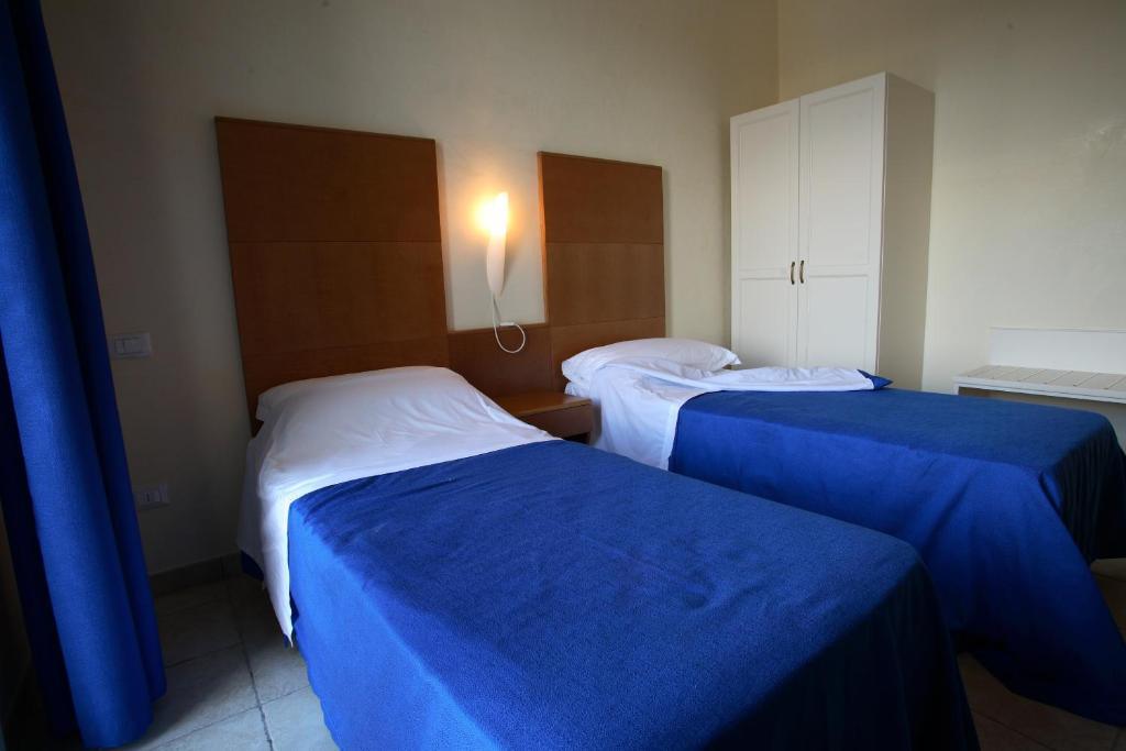 Hotel Resort Portoselvaggio Sant Isidoro  Zimmer foto